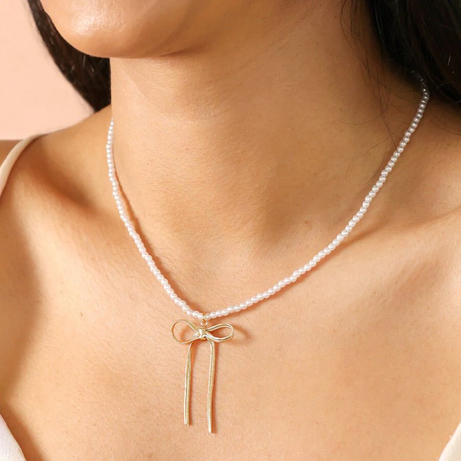 Lisa Angel Pearl Beaded Necklace with Gold Bow Charm - Image 3